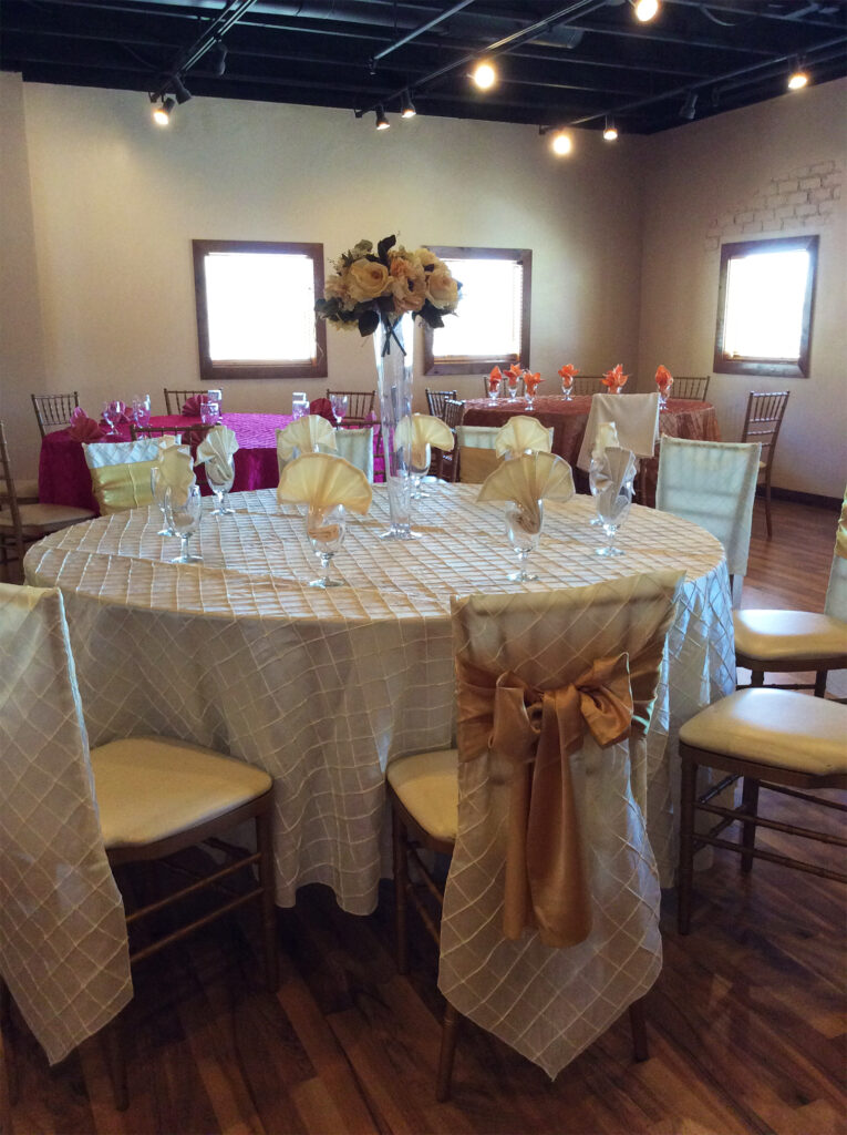 Table and chairs decorated with a textured cloth